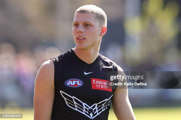 Will Kelly of the Magpies looks on during a Collingwood Magpies AFL training session at AIA Centre on September 26, 2023 in Melbourne, Australia.