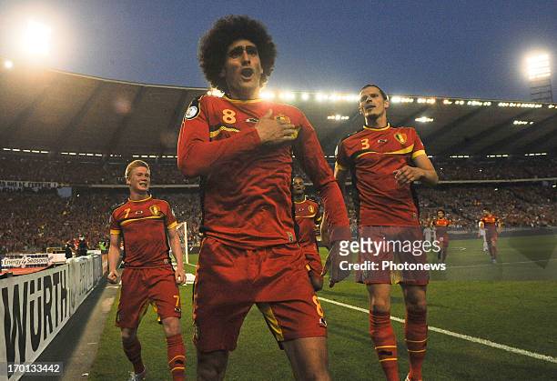 Marouane Fellaini of Belgium celebrates a goal during the FIFA 2014 World Cup Group A qualifying match between Belgium and Serbia at the King...
