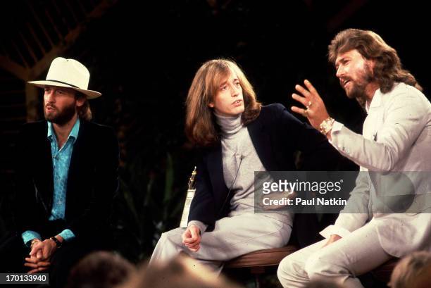 British pop group the Bee Gees appear on television's the Phil Donahue Show, Chicago, Illinois, October 26, 1981. Pictured are, from left, brothers...