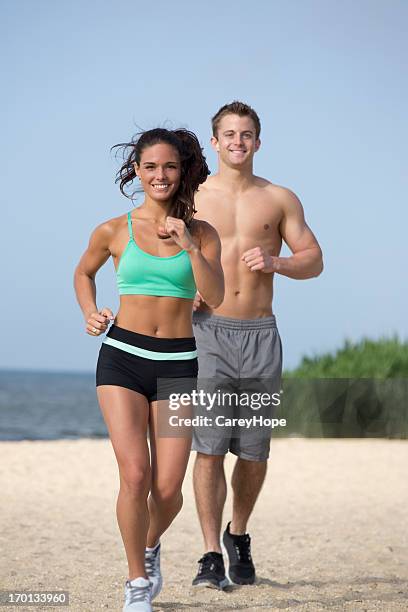 jogging couple - smiling woman waist up stock pictures, royalty-free photos & images