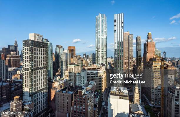 modern residential towers in new york - new york vacation rooftop stock pictures, royalty-free photos & images