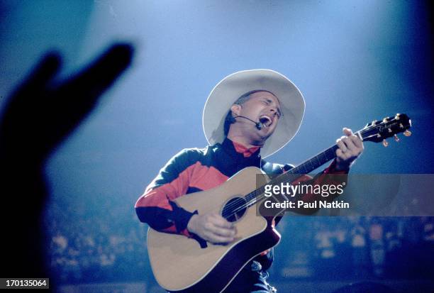 American country musician Garth Brooks performs onstage, Chicago, Illinois, October 1, 1993.