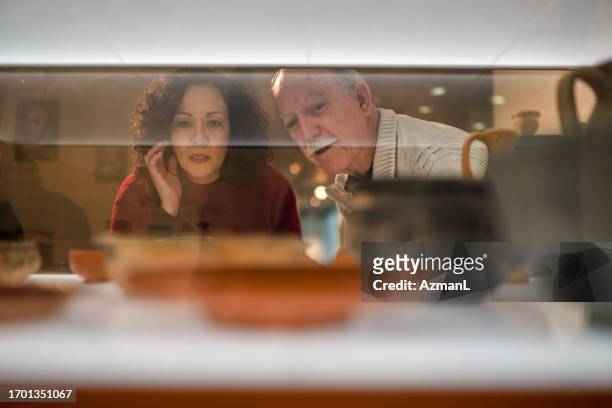 romantic educational date for senior heterosexual couple - jewellery collection stock pictures, royalty-free photos & images