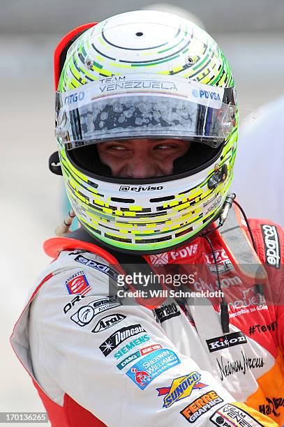 Viso of Venezuela, driver of the Team Venezuela PDVSA/Andretti Autosport Chevrolet, looks on from the grid during qualifying for the IZOD IndyCar...