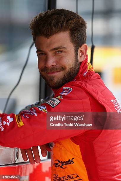 Viso of Venezuela, driver of the Team Venezuela PDVSA/Andretti Autosport Chevrolet, stands on the grid during qualifying for the IZOD IndyCar Series...