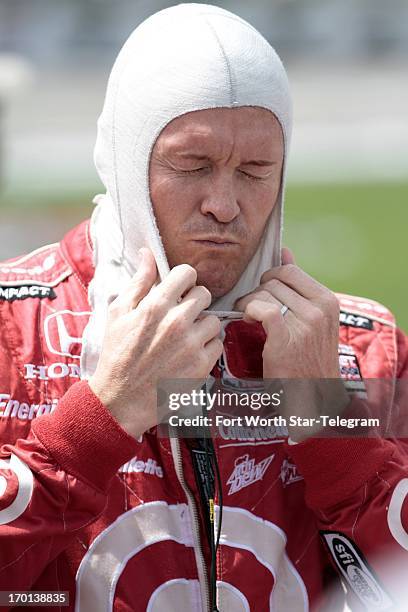 Target Chip Ganassi Racing driver Scott Dixon prepares to get into his car during qualifying for the IZOD IndyCar Series Firestone 550 at Texas Motor...