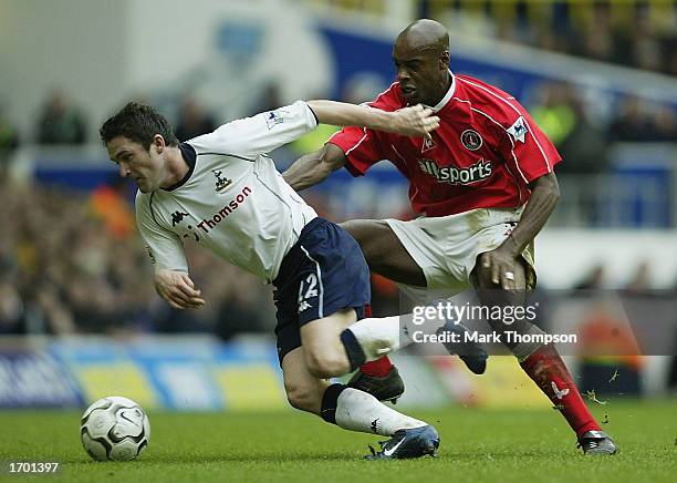 Robbie Keane of Tottenham is challenged by Richard Rufus of Charlton during the FA Barclaycard Premiership match betweeen Tottenham Hotspur and...