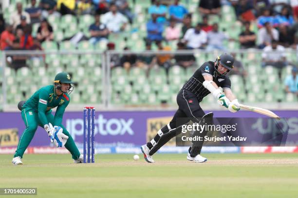 Tom Latham of the New Zealand play a shot during the ICC Men's Cricket World Cup India 2023 warm up match between New Zealand and South Africa at...