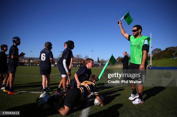 Piri Weepu of the All Blacks raises his flag as he attends the New Zealand Rugby APPLAUD Programme Launch at the College Rifles Rugby Club on June 8,...