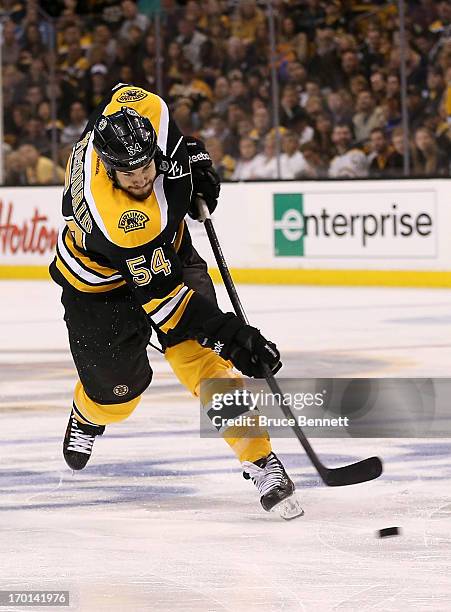 Adam McQuaid of the Boston Bruins shoots and scores in the third period against the Pittsburgh Penguins in Game Four of the Eastern Conference Final...