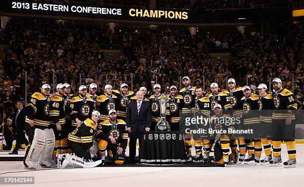 The Boston Bruins pose with the Prince of Wales Trophy after defeating the Pittsburgh Penguins 1-0 in Game Four of the Eastern Conference Final...