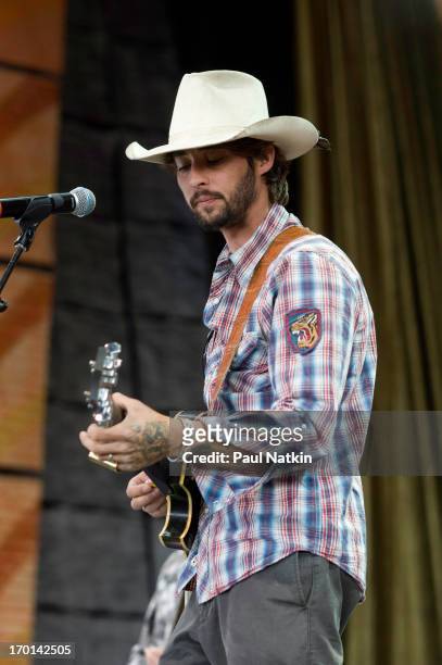 American rock musician Ryan Bingham performs with his band the Dead Horses on stage at the Verizon Wireless Amphitheater, St. Louis, Missouri,...