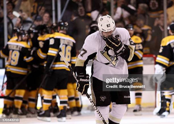 Sidney Crosby of the Pittsburgh Penguins skates off the ice after being defeated by the Boston Bruins 1-0 in Game Four of the Eastern Conference...