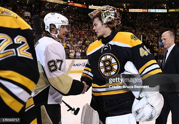 Sidney Crosby of the Pittsburgh Penguins shakes hands with Tuukka Rask of the Boston Bruins after the Bruins defeated the Penguins 1-0 in Game Four...