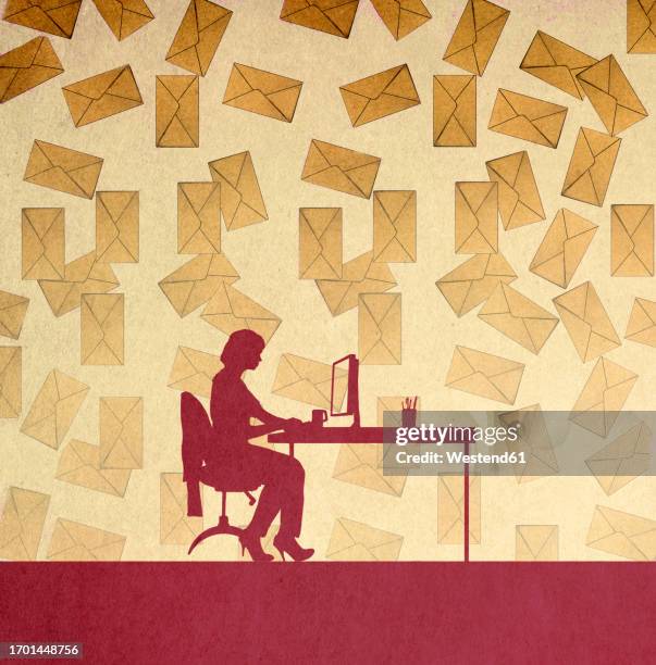 silhouette of woman sitting at desk against large number of falling envelopes - überfluss stock-grafiken, -clipart, -cartoons und -symbole