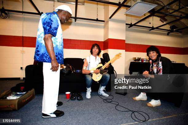 American musician Buddy Guy shares a laugh with British musicians Jeff Beck and Ron Wood backstage at Eric Clapton's Crossroads Guitar Festival at...
