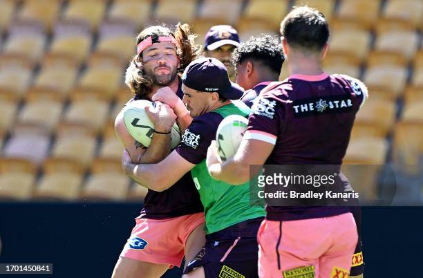 Patrick Carrigan takes on the defence during a Brisbane Broncos NRL training session at Suncorp Stadium on September 26, 2023 in Brisbane, Australia.