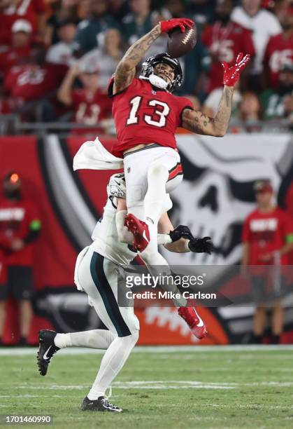 Mike Evans of the Tampa Bay Buccaneers catches a pass defended by Reed Blankenship of the Philadelphia Eagles during the fourth quarter at Raymond...