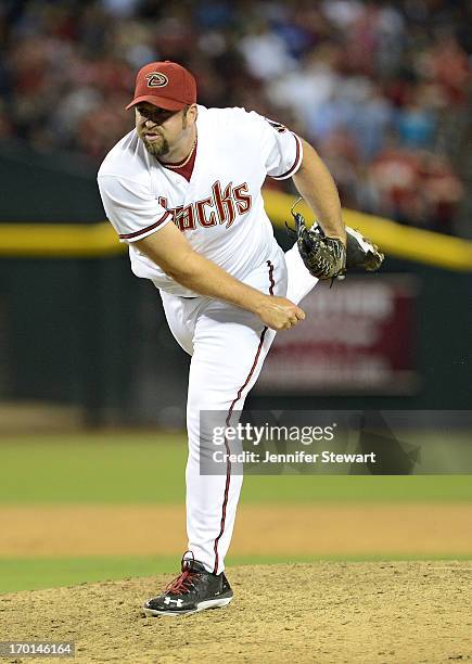 Closing pitcher Heath Bell of the Arizona Diamondbacks pitches against the San Francisco Giants in the ninth inning at Chase Field on June 7, 2013 in...