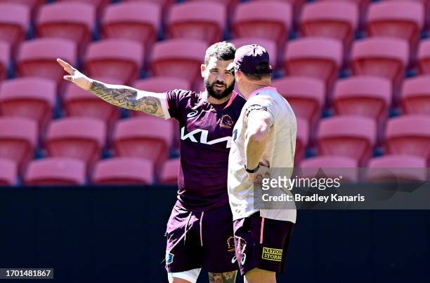 Coach Kevin Walters talks tactics with Adam Reynolds during a Brisbane Broncos NRL training session at Suncorp Stadium on September 26, 2023 in...