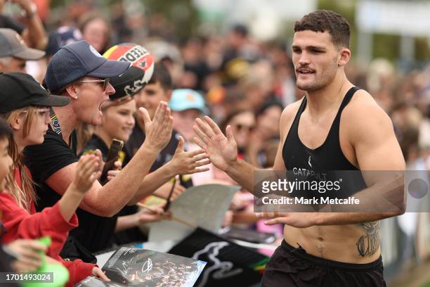 Nathan Cleary of the Panthers high-fives fans during a Penrith Panthers NRL training session at BlueBet Stadium on September 26, 2023 in Penrith,...