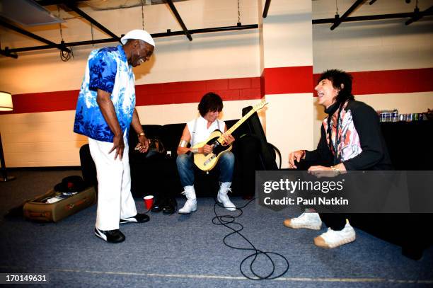 American musician Buddy Guy shares a laugh with British musicians Jeff Beck and Ron Wood backstage at Eric Clapton's Crossroads Guitar Festival at...