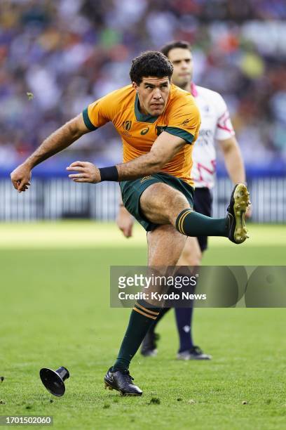 Ben Donaldson of Australia kicks a penalty goal during the first half of a Rugby World Cup Pool C match against Portugal at Stade Geoffroy-Guichard...
