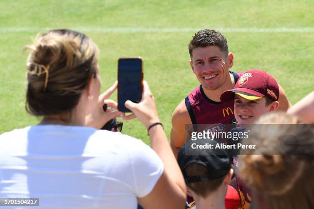 Dayne Zorko of the Lions interacts with fans during a Brisbane Lions AFL training session at Brighton Homes Arena on September 26, 2023 in Ipswich,...