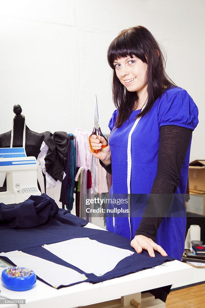 Fashion designer in her studio