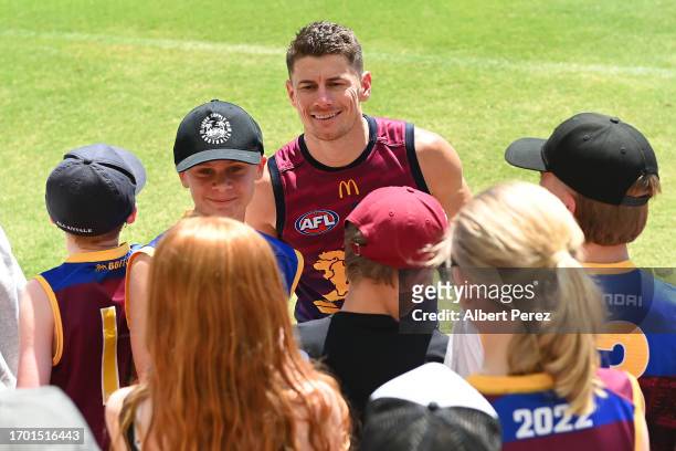 Dayne Zorko of the Lions interacts with fans during a Brisbane Lions AFL training session at Brighton Homes Arena on September 26, 2023 in Ipswich,...