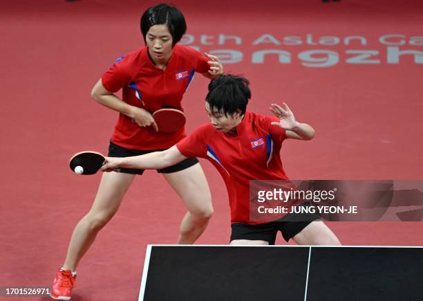 North Korea's Cha Su Yong and Pak Su Gyong compete against South Korea's Jeon Ji-hee and Shin Yu-bin in the women's doubles final table tennis match...