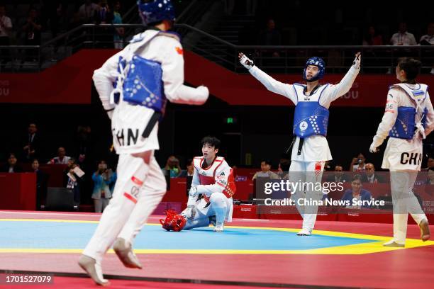 Song Zhaoxiang of Team China celebrates after winning the Taekwondo - Mixed Gender Team Gold Medal Contest against Team South Korea on day two of the...