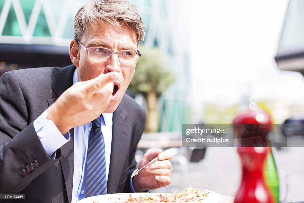 Businessman having lunch