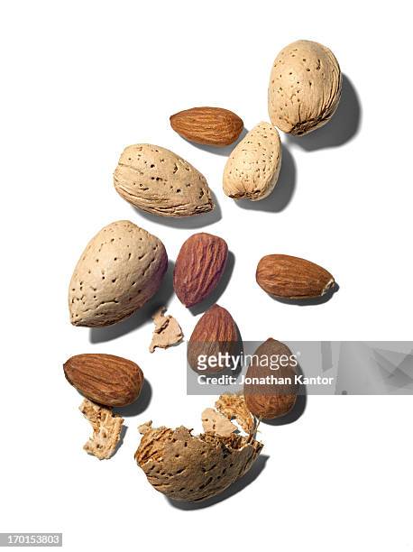 almonds - almonds on white stock-fotos und bilder