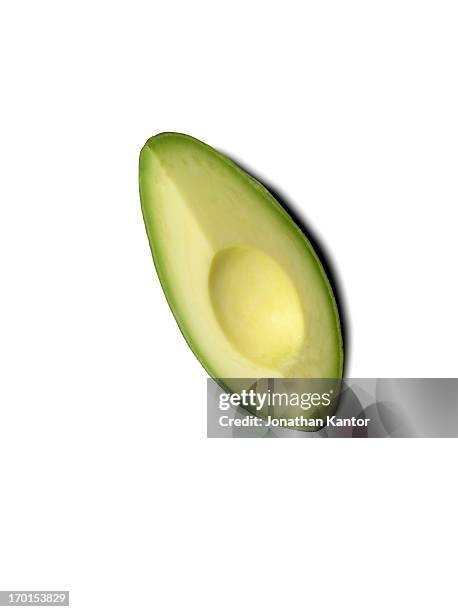 avocado slice - avocado isolated stock-fotos und bilder