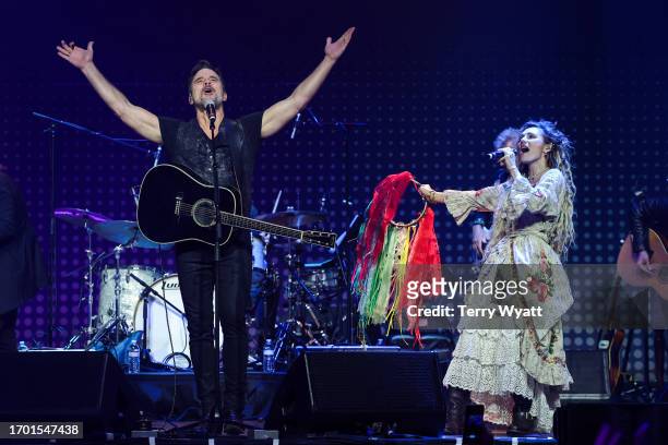 Charles Esten and Clare Bowen perform during the Nashville Reunion Tour at Ryman Auditorium on September 25, 2023 in Nashville, Tennessee.