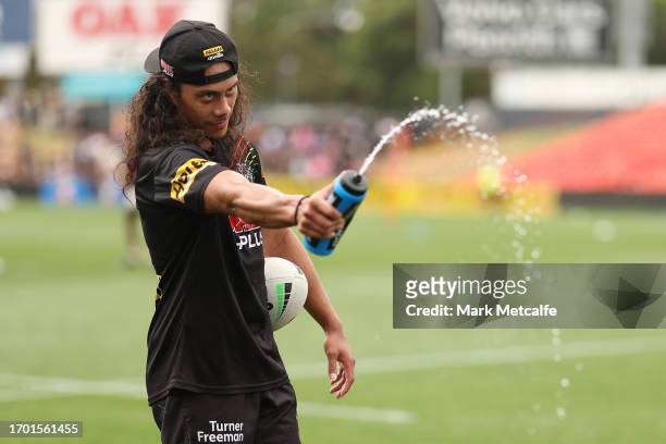 Jarome Luai of the Panthers squirts a drink bottle during a Penrith Panthers NRL training session at BlueBet Stadium on September 26, 2023 in...