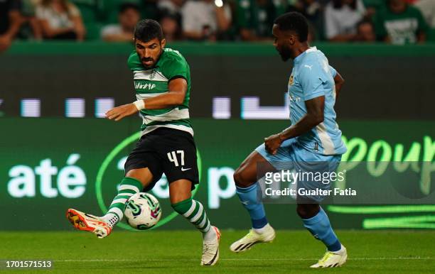Ricardo Esgaio of Sporting CP with Savio of Rio Ave FC in action during the Liga Portugal Betclic match between Sporting CP and Rio Ave FC at Estadio...