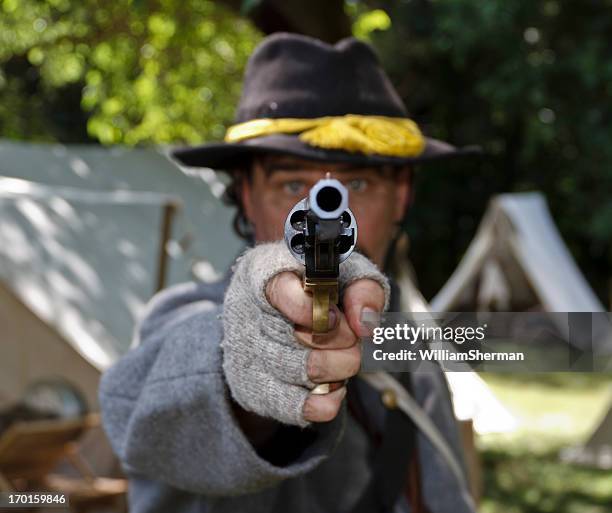 pointing a gun and ready to fire - reenactment stock pictures, royalty-free photos & images