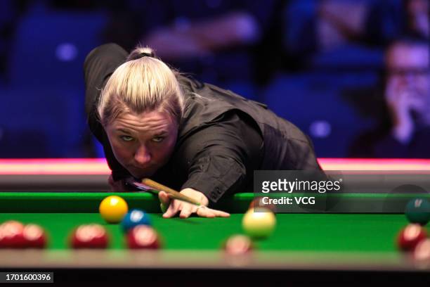 Rebecca Kenna of England plays a shot in the first round match against Shaun Murphy of England on day one of the 2023 Cazoo British Open at the...