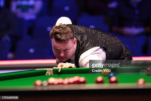 Shaun Murphy of England plays a shot in the first round match against Rebecca Kenna of England on day one of the 2023 Cazoo British Open at the...