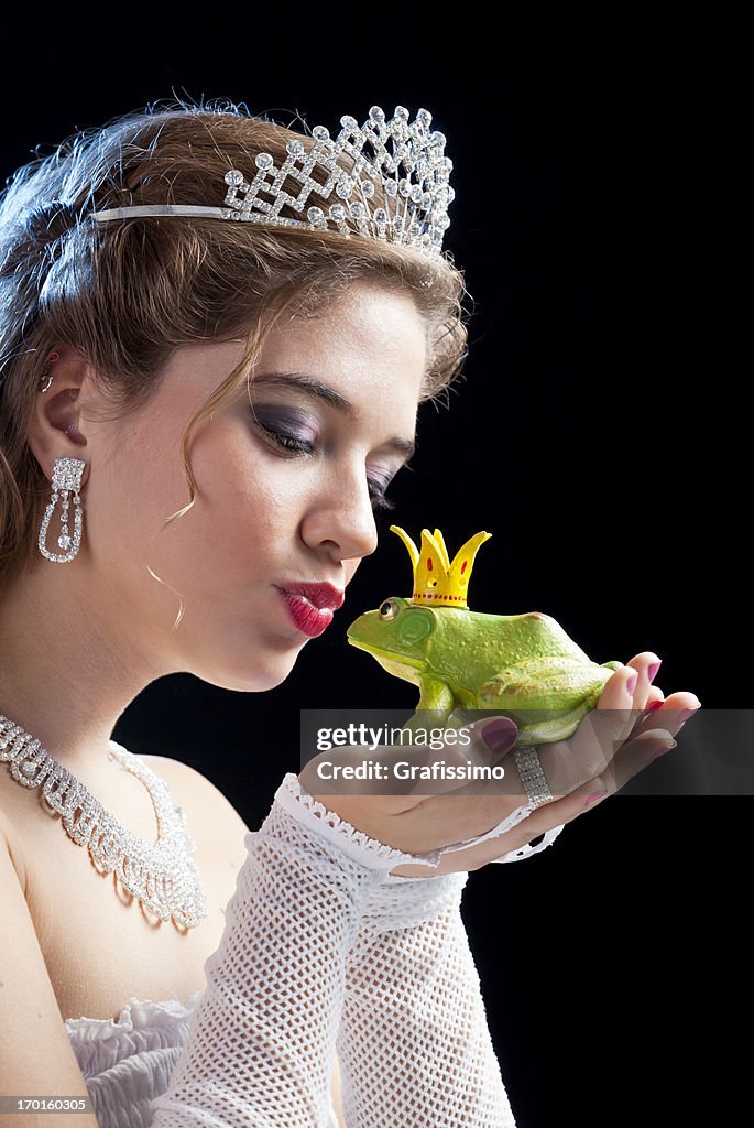 Blonde princess kissing a frog