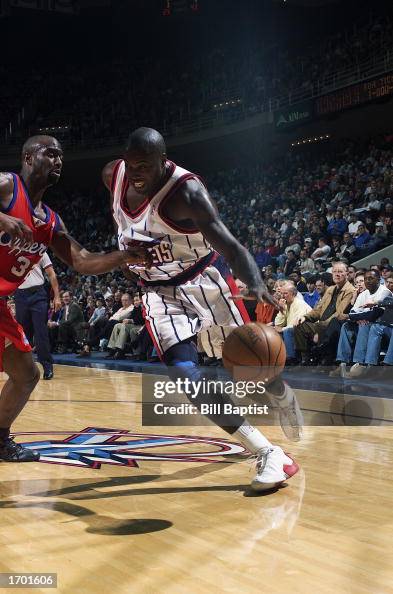 Glen Rice Houston Rockets Glen Rice of the Houston Rockets drives around Tremaine Fowlkes of ...