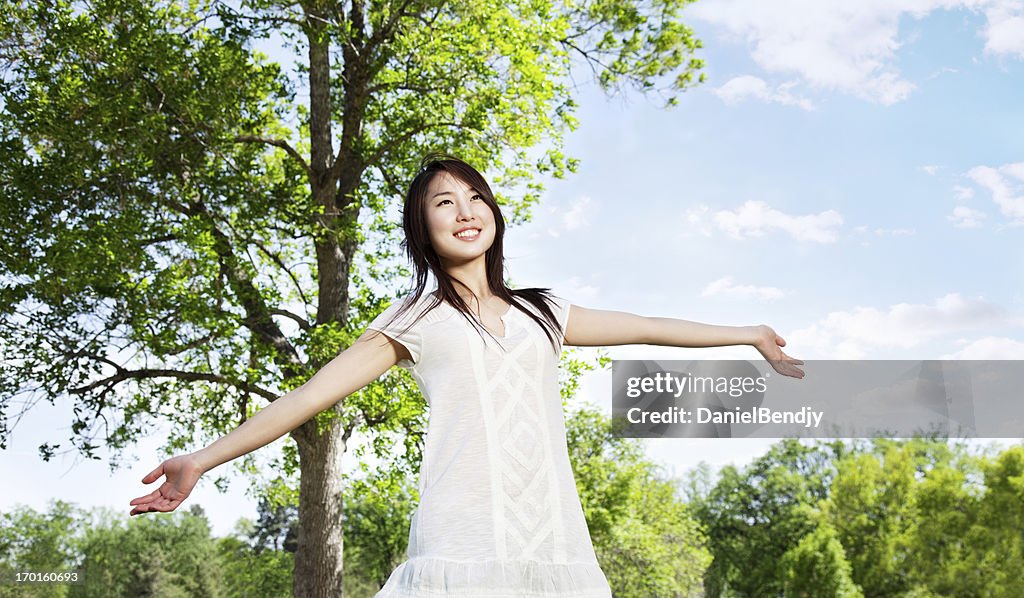 Young Asian Woman Outdoor Series: Enjoying Summer in the Park