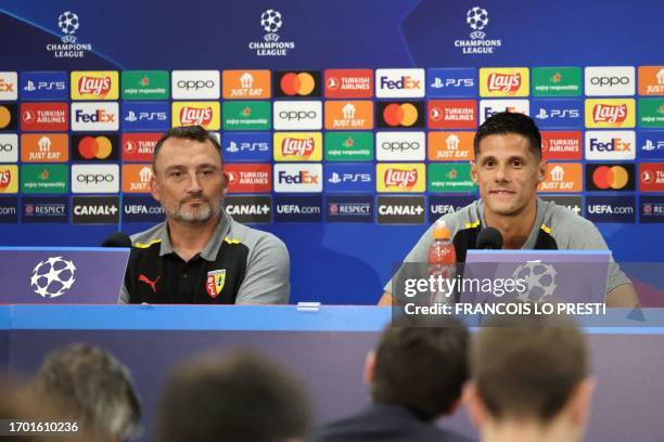 Lens' French head coach Franck Haise and Lens' French forward Florian Sotoca hold a press conference at the Bollaert stadium, on October 2 on the...