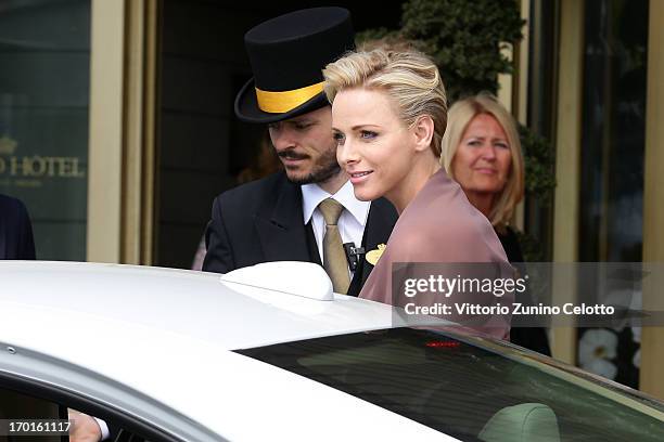 Princess Charlene of Monaco departs The Grand Hotel to attend the wedding of Princess Madeleine of Sweden and Christopher O'Neill hosted by King Carl...