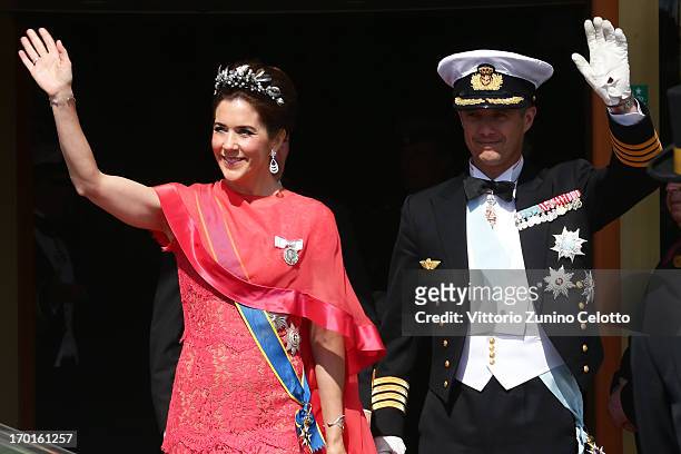 Princess Mary of Denmark and Crown Prince Frederik of Denmark depart The Grand Hotel to attend the wedding of Princess Madeleine of Sweden and...