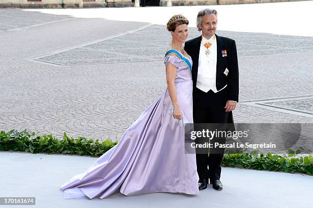 Princess Martha Louise of Norway and Ari Mikael Behn attend the wedding of Princess Madeleine of Sweden and Christopher O'Neill hosted by King Carl...