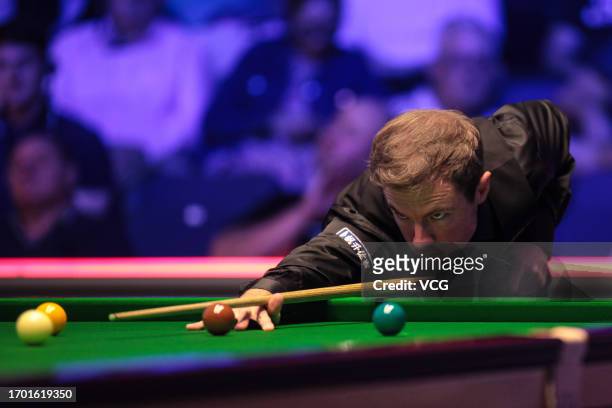Jack Lisowski of England plays a shot in the first round match against Joe O'Connor of England on day one of the 2023 Cazoo British Open at the...