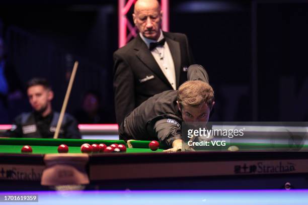 Jack Lisowski of England plays a shot in the first round match against Joe O'Connor of England on day one of the 2023 Cazoo British Open at the...